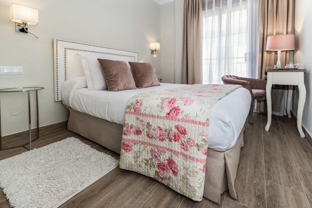 Foto de una habitación de Hostal Boutique Plaza Cantarero
