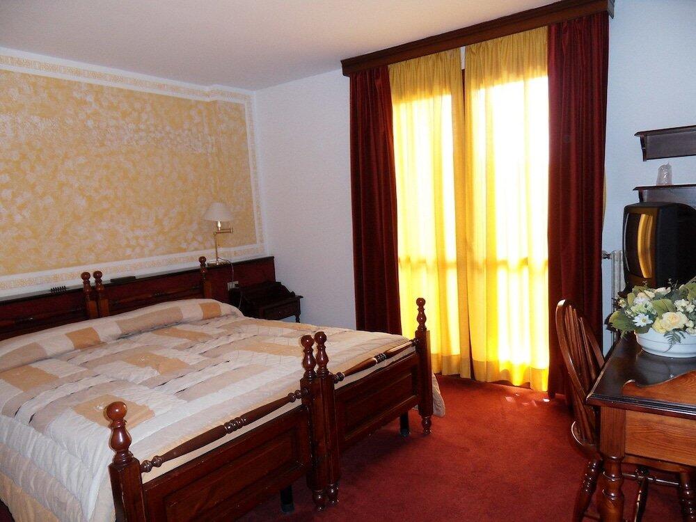 Foto de una habitación de HOTEL ANTARES