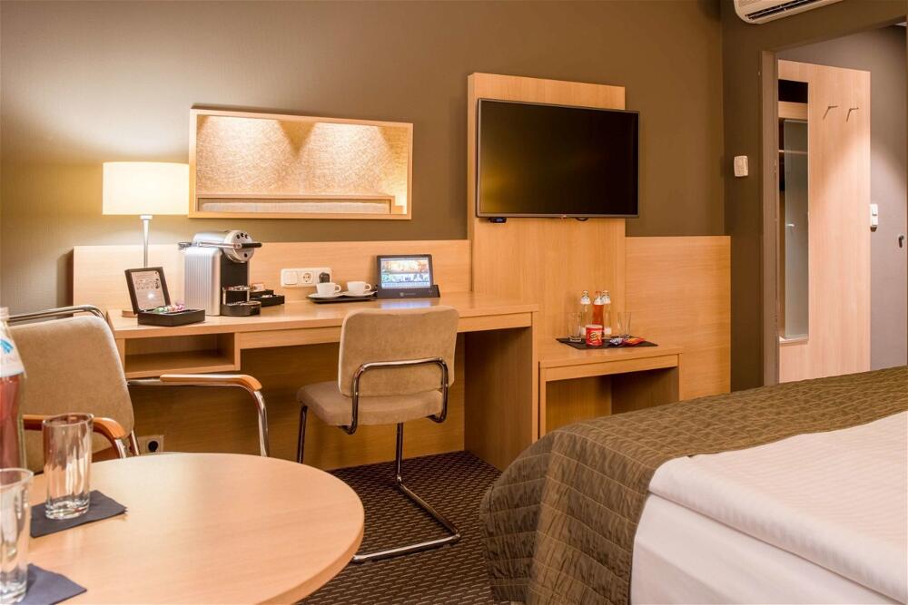 Foto de una habitación de Best Western Premier Central Hotel Leonhard