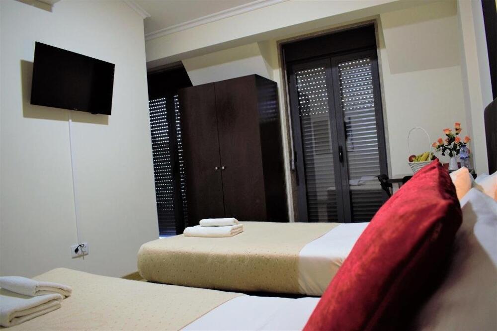 Foto de una habitación de Hostal Universo Romântico