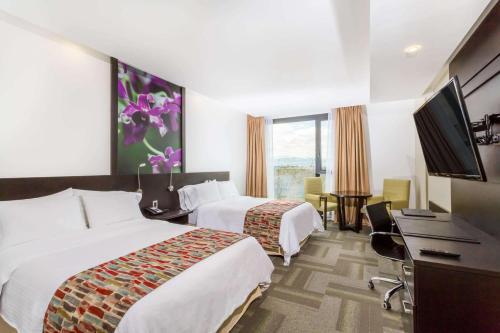 Foto de una habitación de Hotel Wyndham Quito Airport