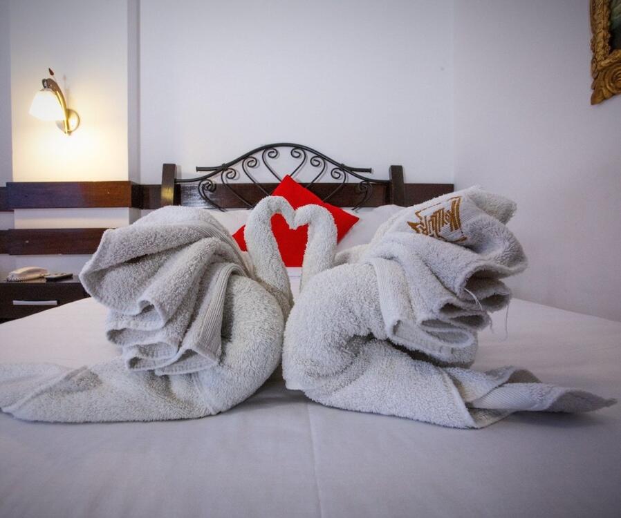 Foto de una habitación de Hotel Koyllur Inn