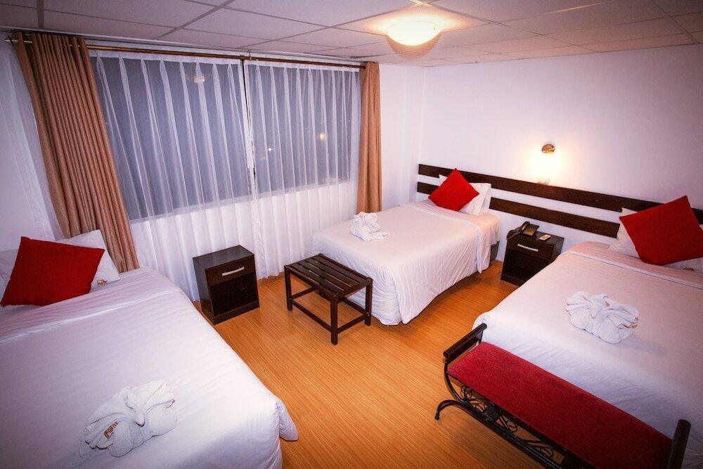 Foto de una habitación de Hotel Koyllur Inn