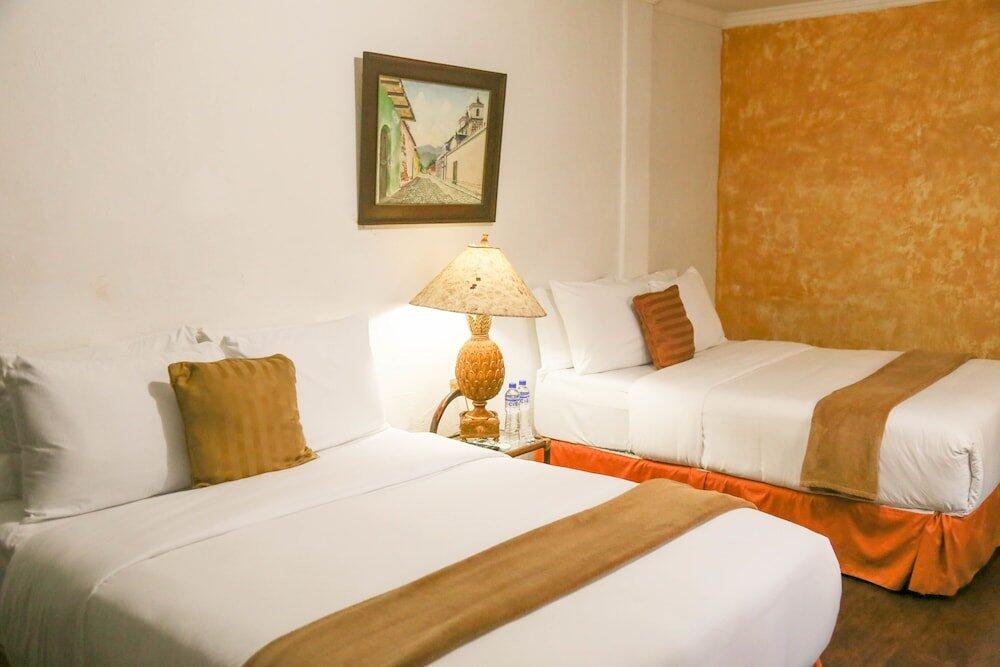 Foto de una habitación de El Carmen Hotel