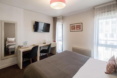 Foto de una habitación de Appart&amp;#039;City Confort Paris Villejuif