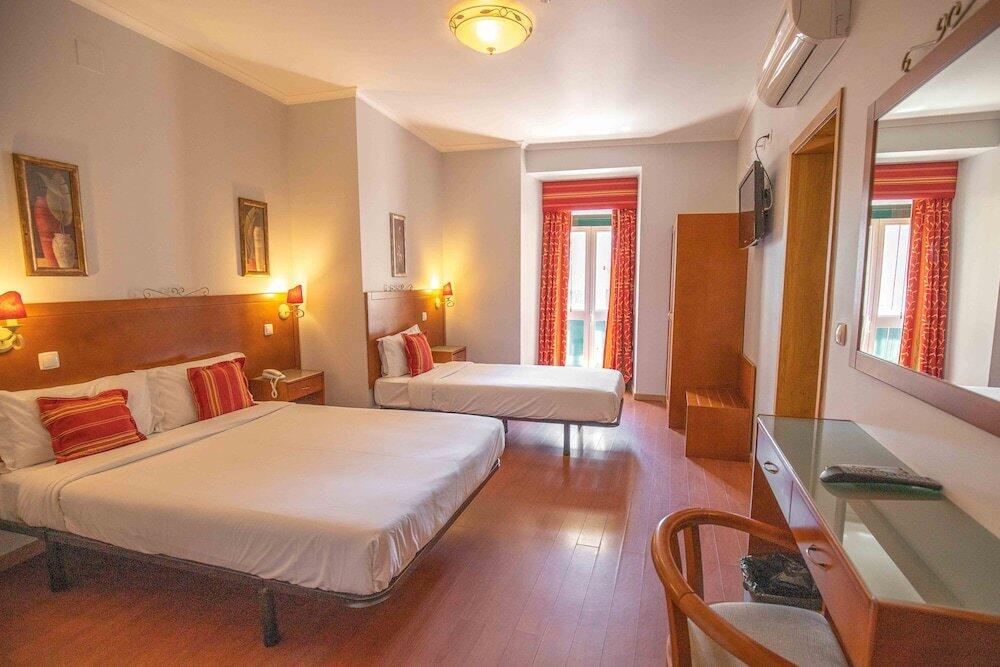 Foto de una habitación de Grande Pensão Alcobia