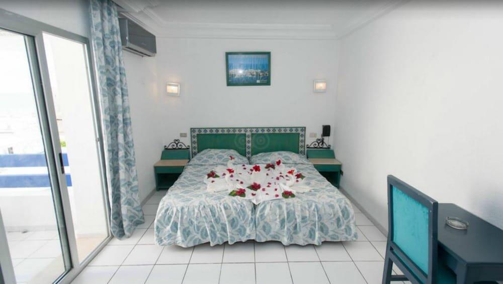 Foto de una habitación de Hotel Les Pyramides