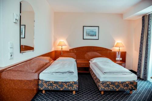 Foto de una habitación de Hotel Shodlik Palace