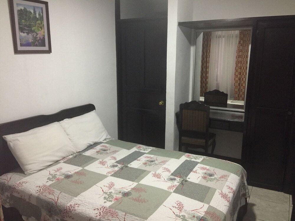 Foto de una habitación de Hotel America