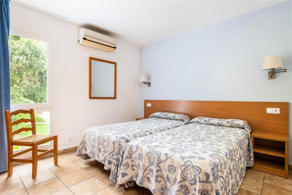 Foto de una habitación de Apartamentos Galdana Gardens