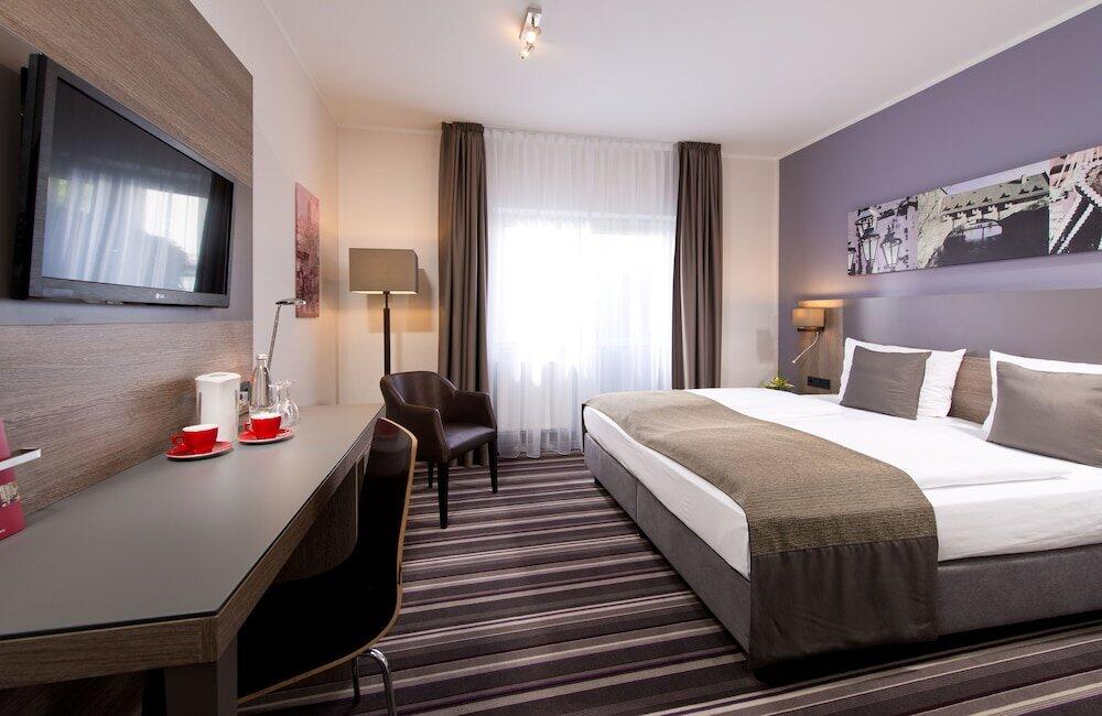 Foto de una habitación de Leonardo Hotel Nürnberg