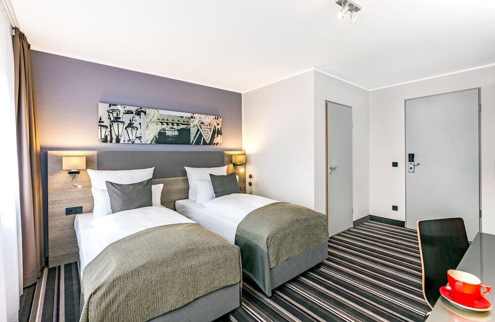 Foto de una habitación de Leonardo Hotel Nürnberg