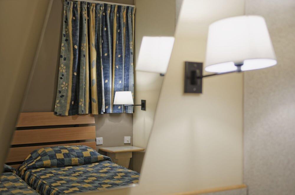 Foto de una habitación de Porto Azzurro Aparthotel