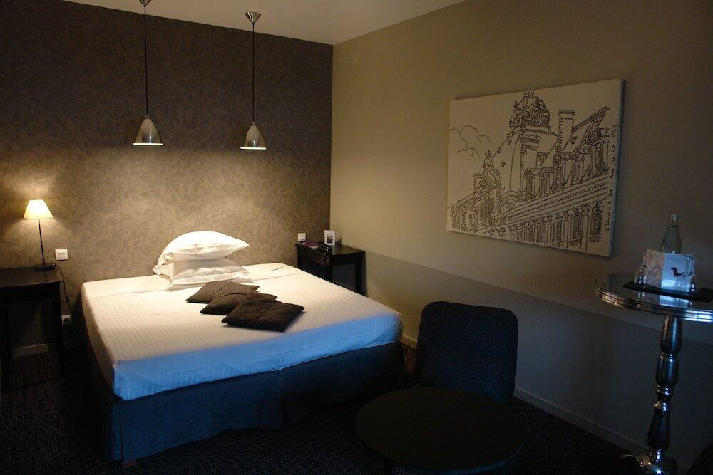 Foto de una habitación de Hôtel Lecoq Gadby, The Originals Relais