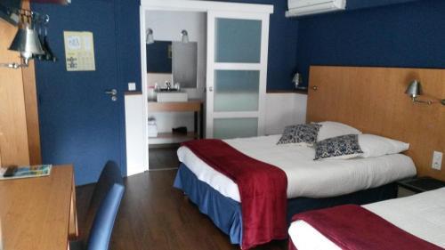 Foto de una habitación de Brit Hotel De Paris