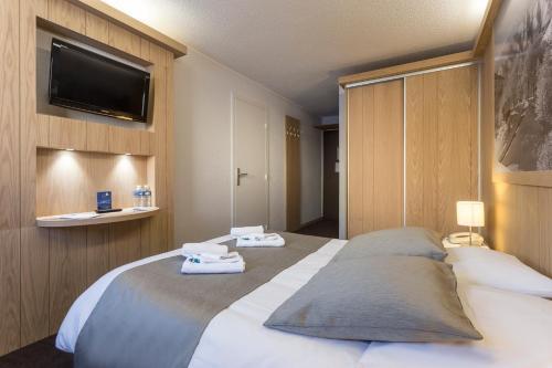 Foto de una habitación de Hôtel Club mmv Les Bergers ****