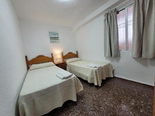 Foto de una habitación de Apartamentos Vera Cruz - Fincas Benidorm