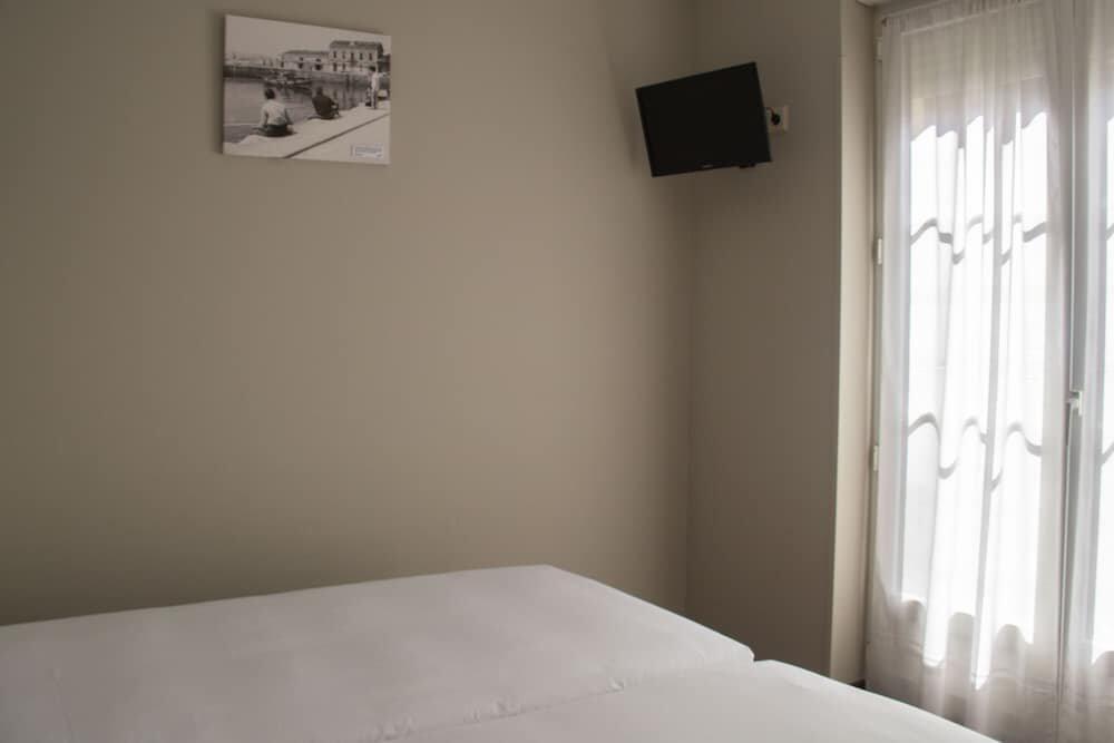 Foto de una habitación de Albergue Alda Miramar Rooms