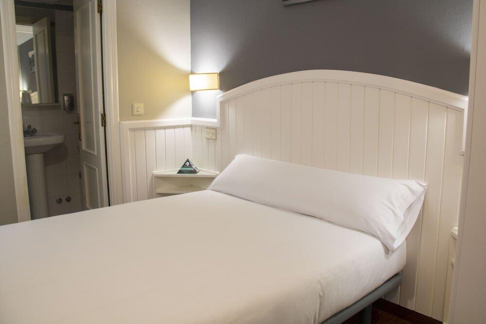 Foto de una habitación de Albergue Alda Miramar Rooms