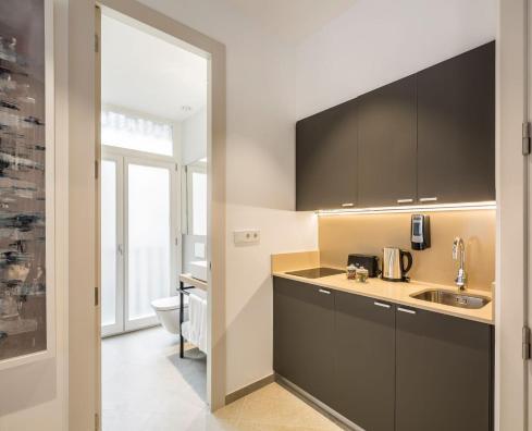 Foto de una habitación de Apartamentos Mon Suites Benlliure