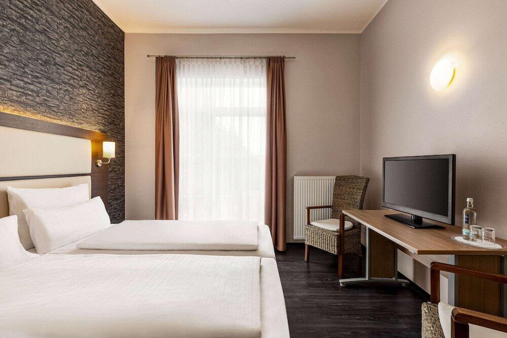 Foto de una habitación de Hotel Amedia Express Bielefeld, Trademark Collection by Wyndham