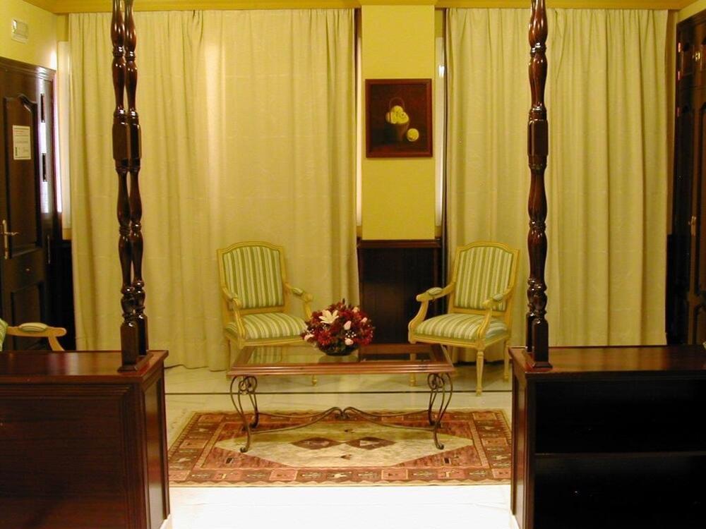 Foto de una habitación de Hotel Las Acacias
