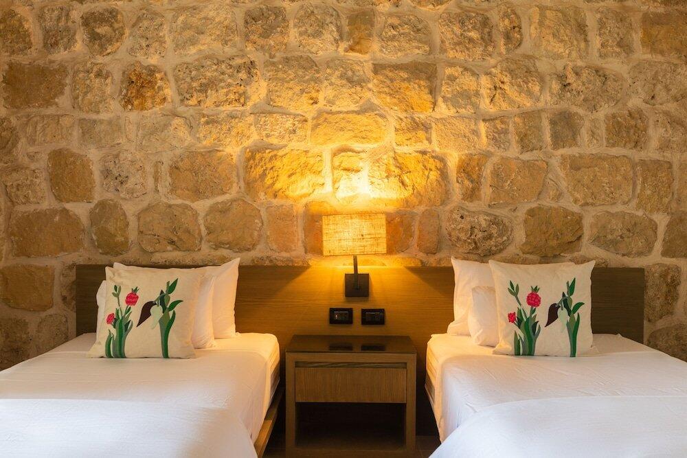 Foto de una habitación de Hotel Wadi Sabarah Lodge