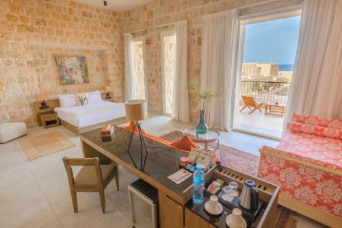 Foto de una habitación de Hotel Wadi Sabarah Lodge