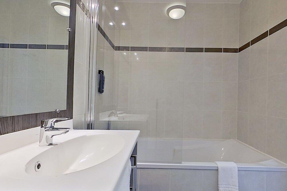 Foto del baño de City Résidence Tours