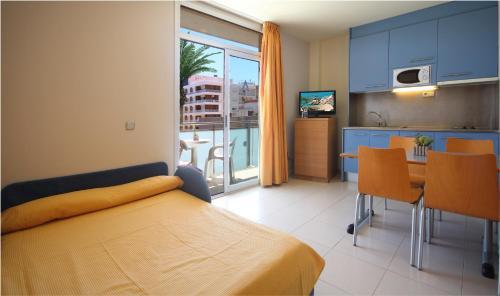 Foto de una habitación de AQUA Hotel Nostre Mar Apartments
