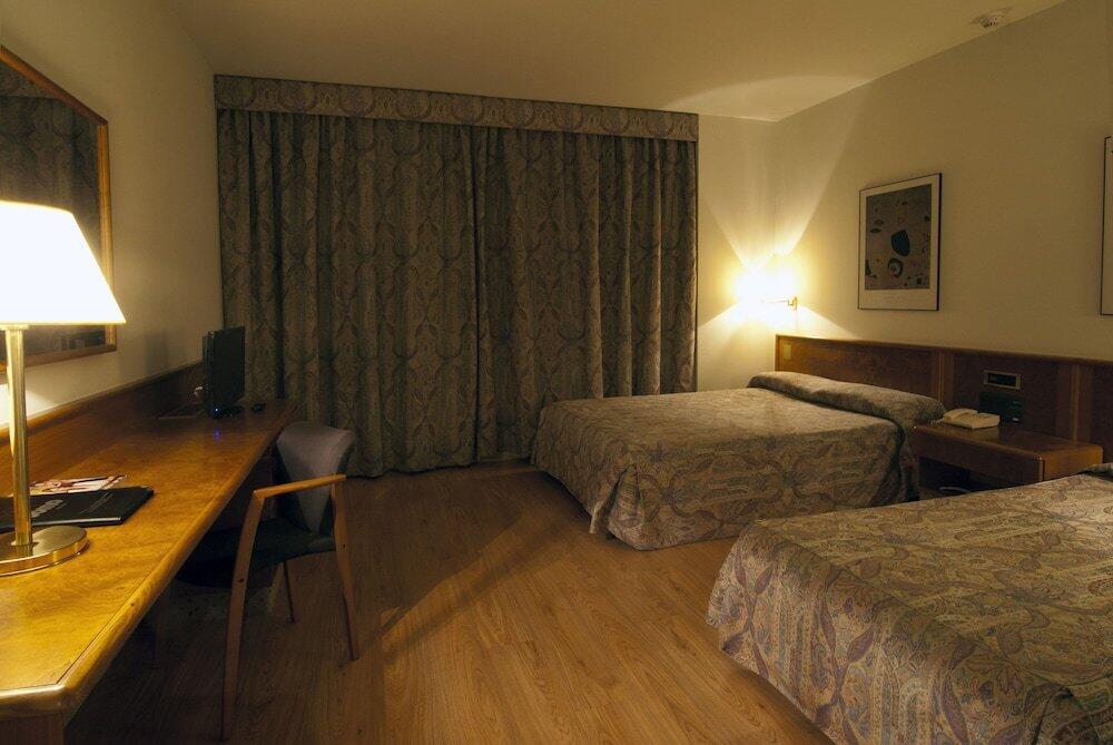 Foto de una habitación de Hotel Sercotel Domo