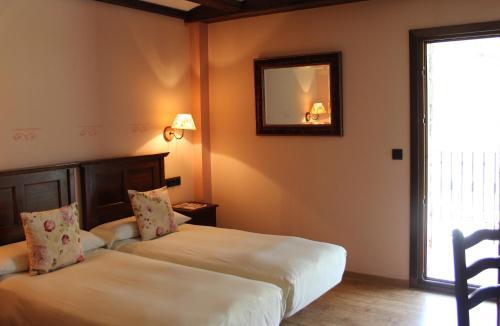Foto de una habitación de Hotel Casa Arcas