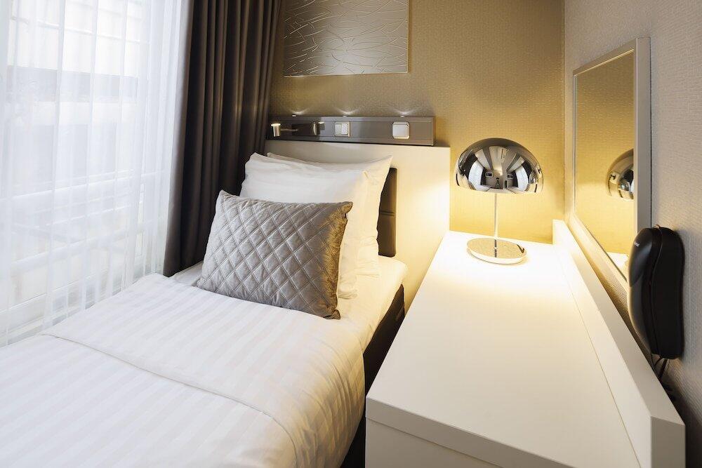 Foto de una habitación de Hotel CC