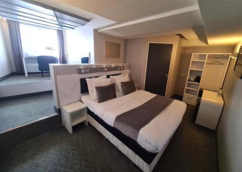 Foto de una habitación de Hotel CC