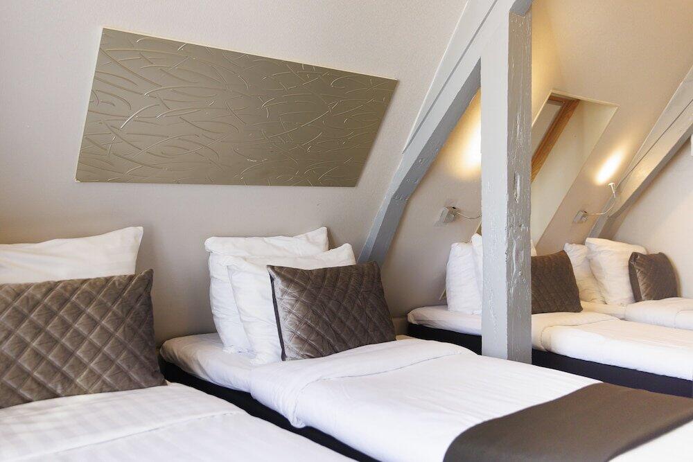 Foto de una habitación de Hotel CC