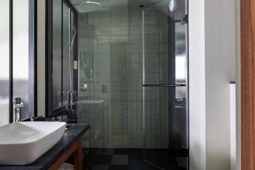 Foto del baño de Hotel AROTEL