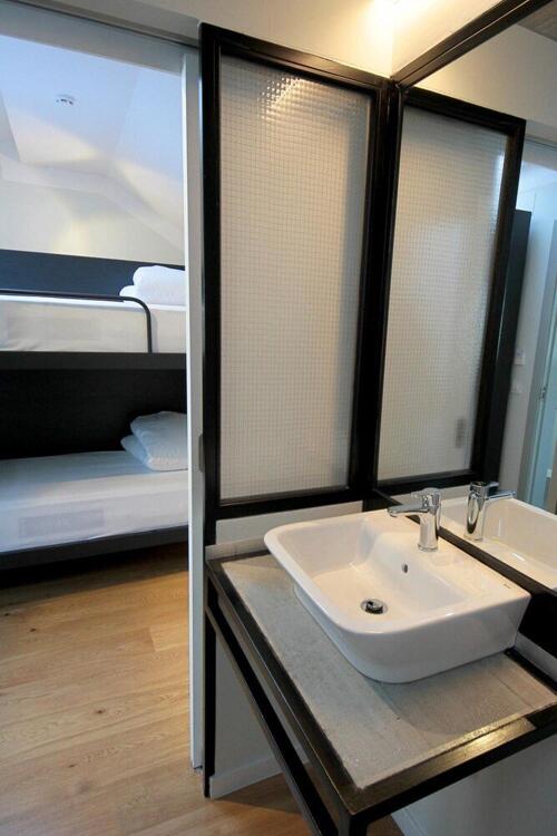 Foto del baño de Complutum Hostel