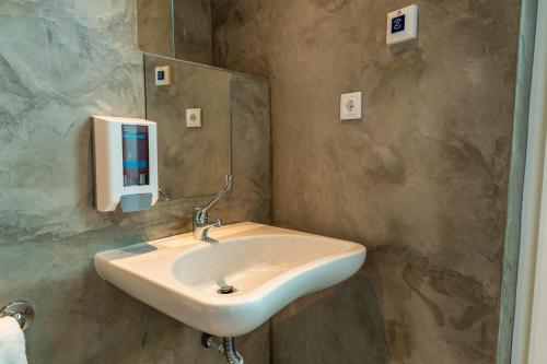 Foto del baño de Olá Vida - Hostel Caminha