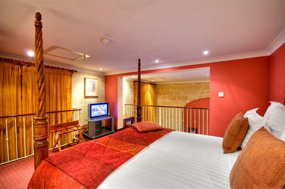 Foto de una habitación de Hotel AX Palazzo Capua