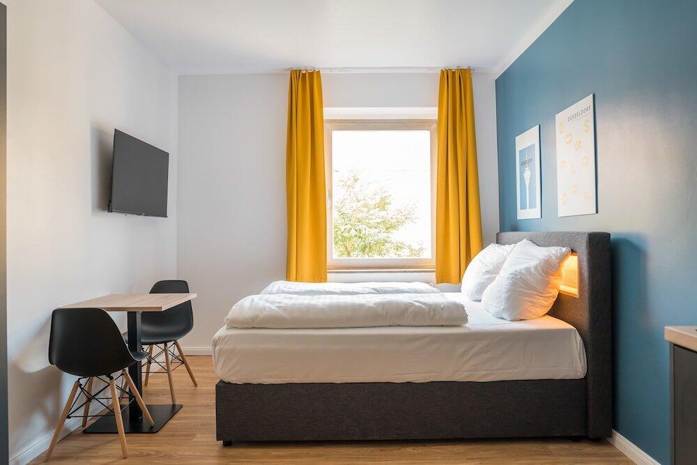 Foto de una habitación de Antares Apartments
