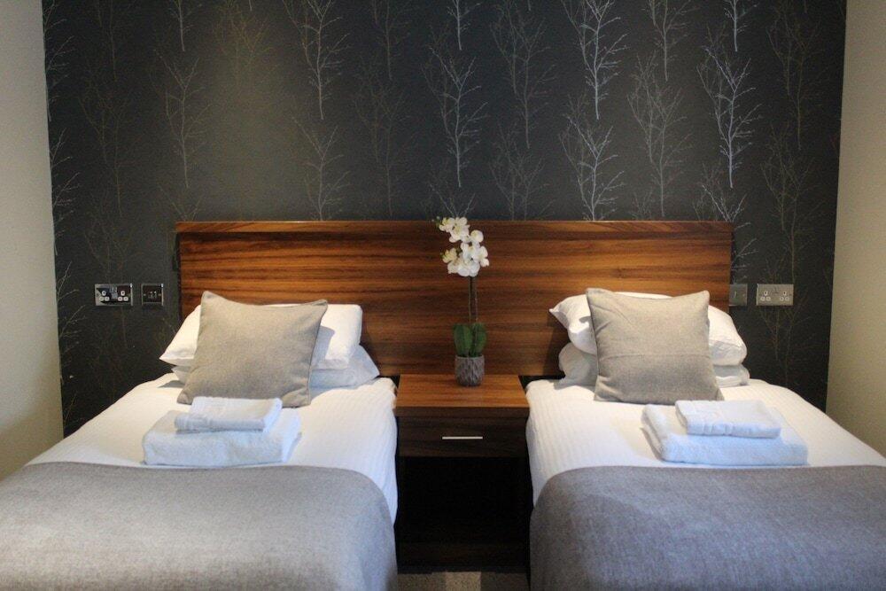 Foto de una habitación de Aparthotel The Craibstone Suites