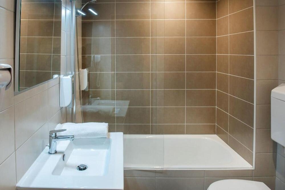 Foto del baño de Hotel Stella