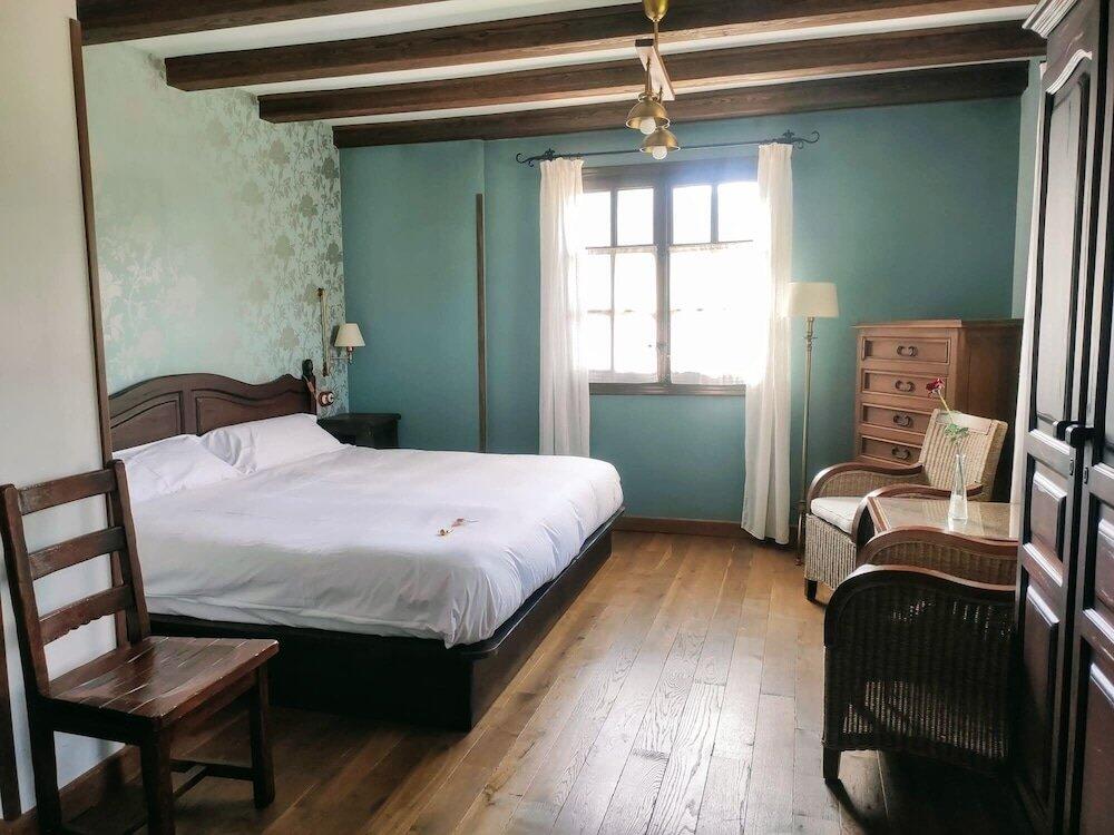 Foto de una habitación de Hotel Rural El Mirador de los Pirineos