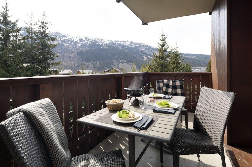 Foto de una habitación de Résidence Pierre &amp;amp; Vacances Premium Les Fermes De Méribel