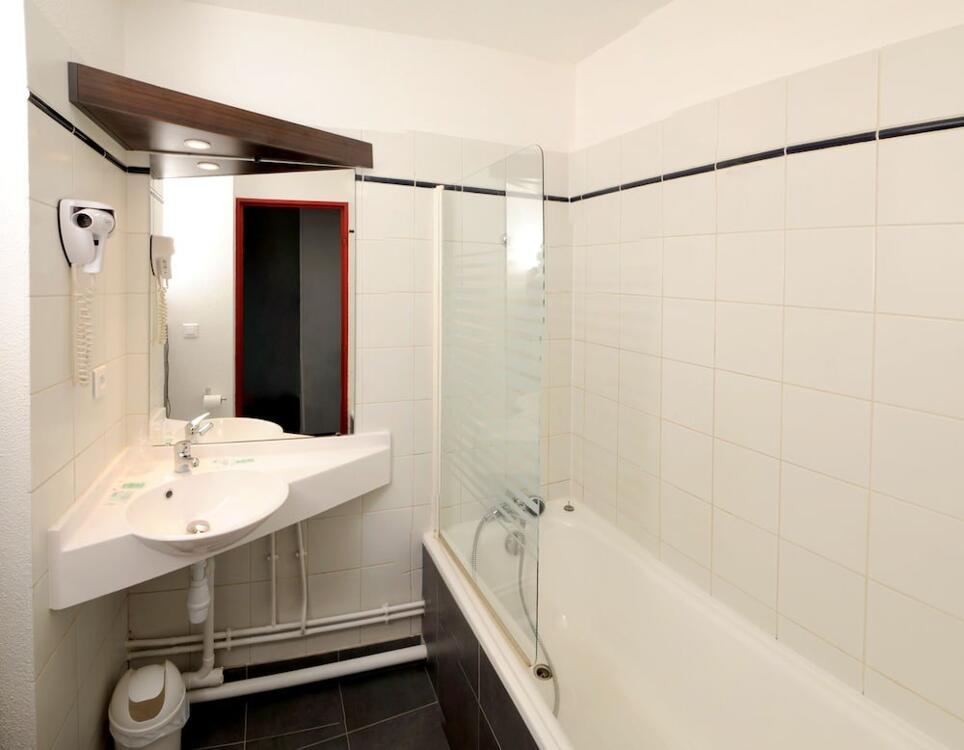 Foto del baño de Hotel Urban by balladins Eaubonne