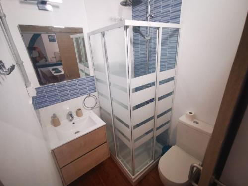 Foto del baño de Atlantis Surf Hostel