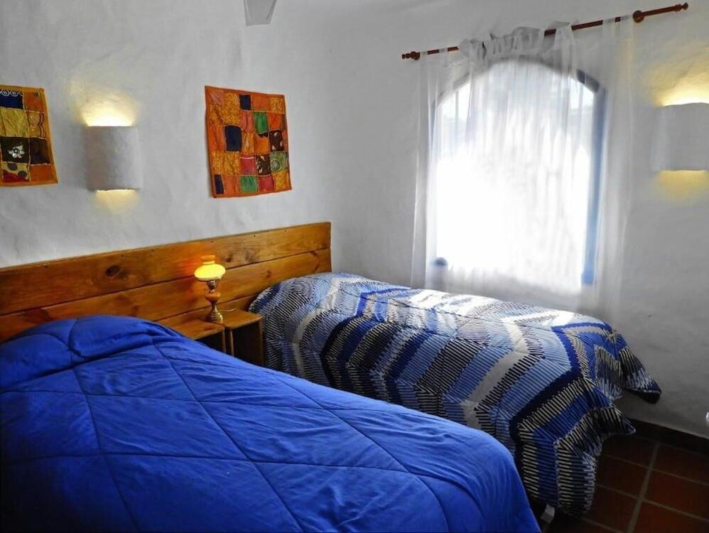Foto de una habitación de Aparthotel El Faro de Carpier