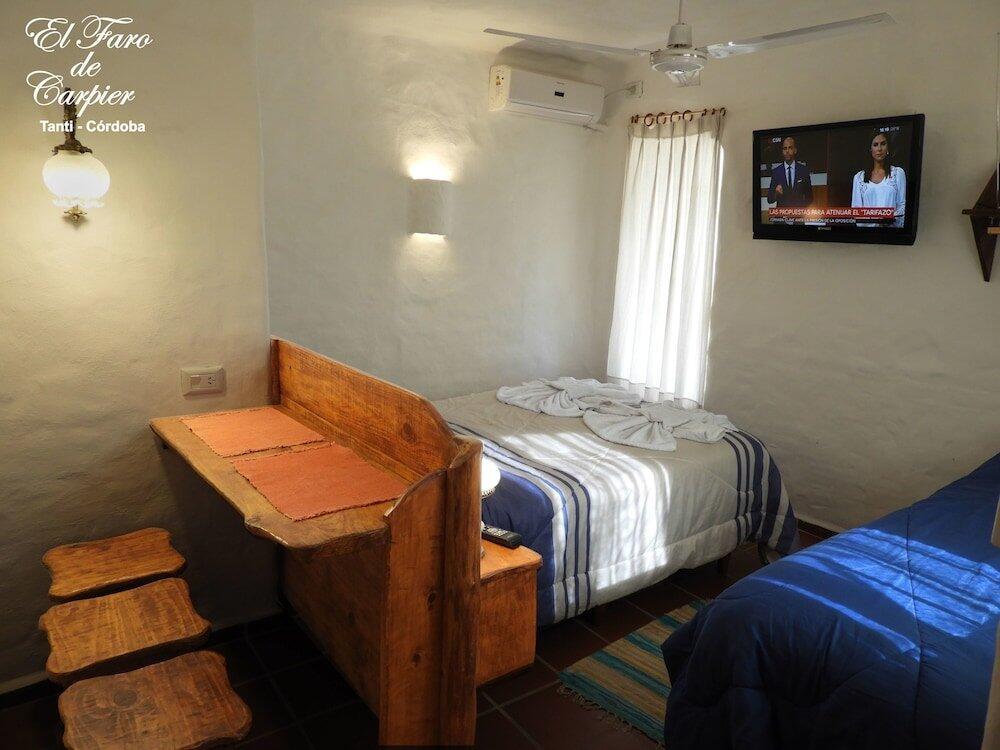 Foto de una habitación de Aparthotel El Faro de Carpier