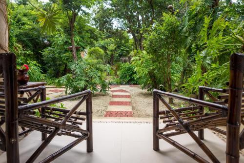 Foto de una habitación de Villas El Encanto Cozumel