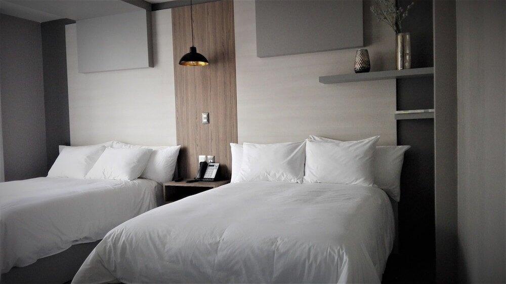 Foto de una habitación de ESDUMA HK HOTEL Pachuca